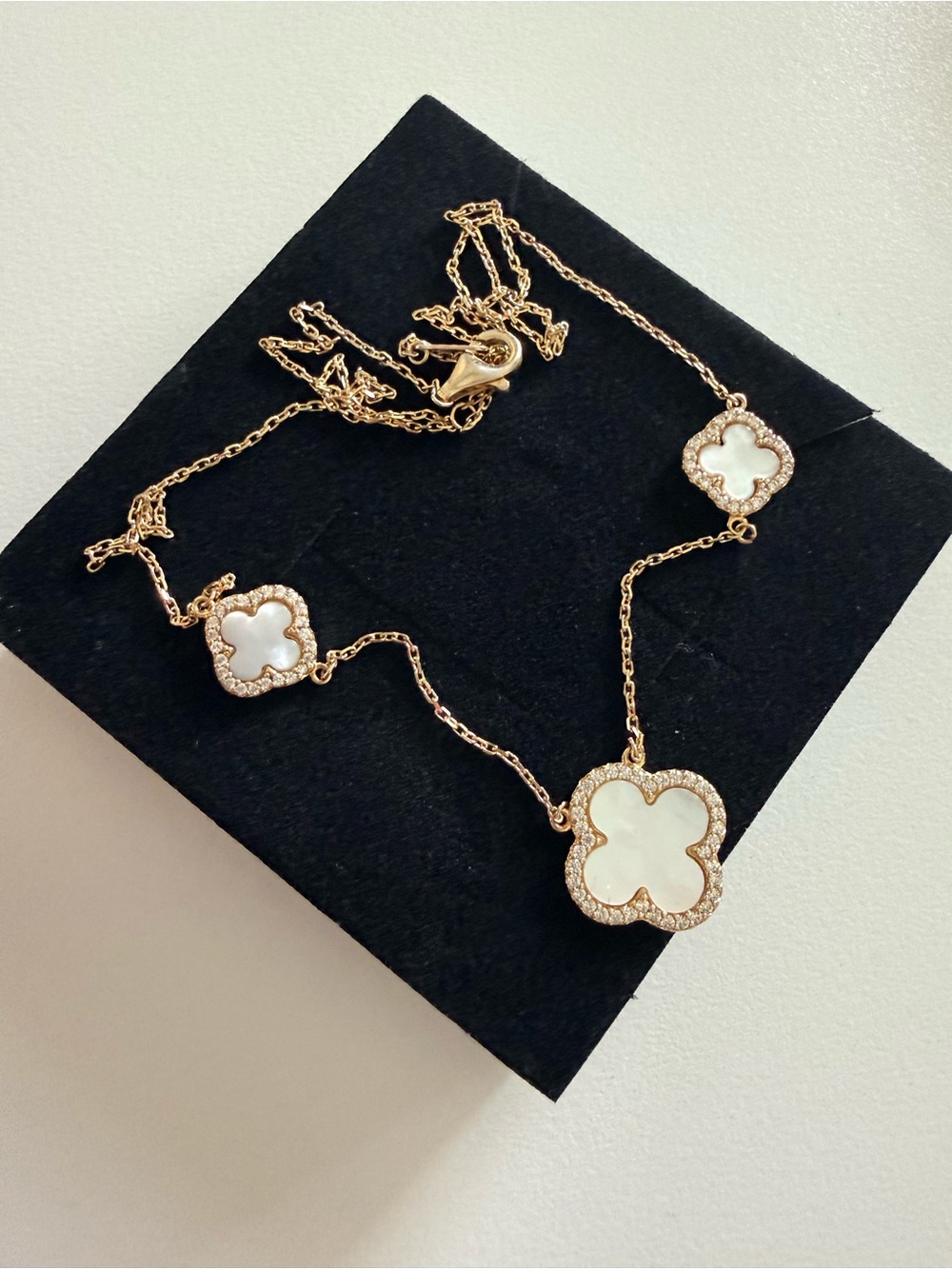 Gold Color Clover Necklace with white pearl color